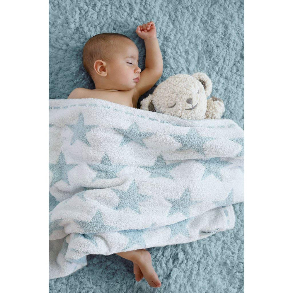 SNOObear sleep-closeup emphasizes bedtime comfort and gentle sounds.