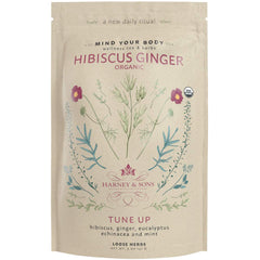 Harney & Sons Organic Hibiscus Ginger Tune-Up tea cup—refreshing and aromatic.