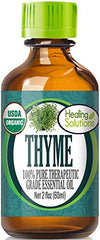 Healing Solutions Thyme Oil bottle closeup highlighting purity for diffuser blends.