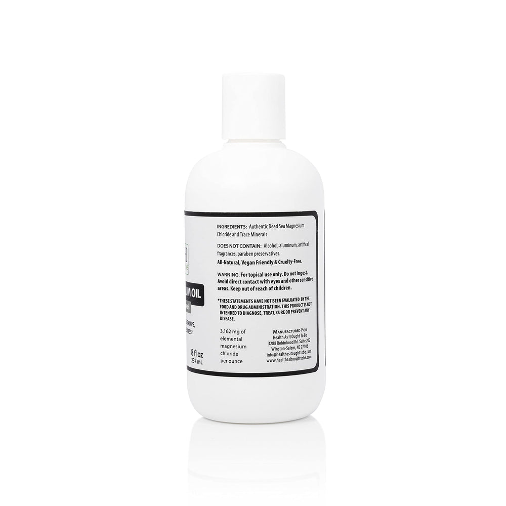 Health As It Ought To Be Dead Sea Magnesium Oil application close-up showing skin absorption.