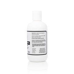 Health As It Ought To Be Dead Sea Magnesium Oil application close-up showing skin absorption.