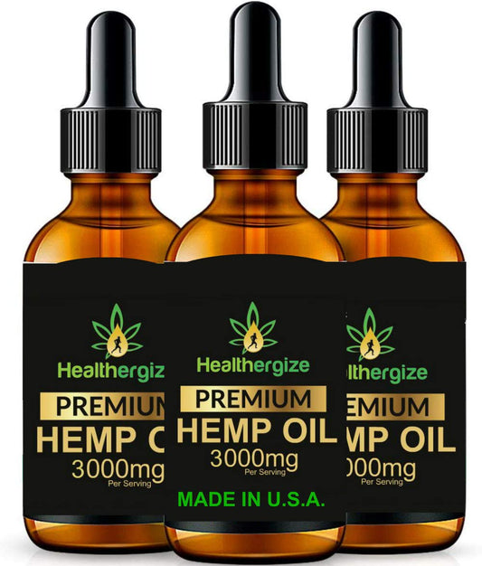 Healthergize Hemp Oil Premium bottle on a counter, supporting daily wellness.