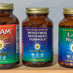 HealthForce Intestinal Movement Formula capsules with natural light for plant-based care