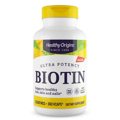 Healthy Origins Biotin 10,000 mcg bottle close-up for hair and nails support.