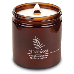 Hemlock Park crackling wood wick candle with sandalwood for cozy evenings.