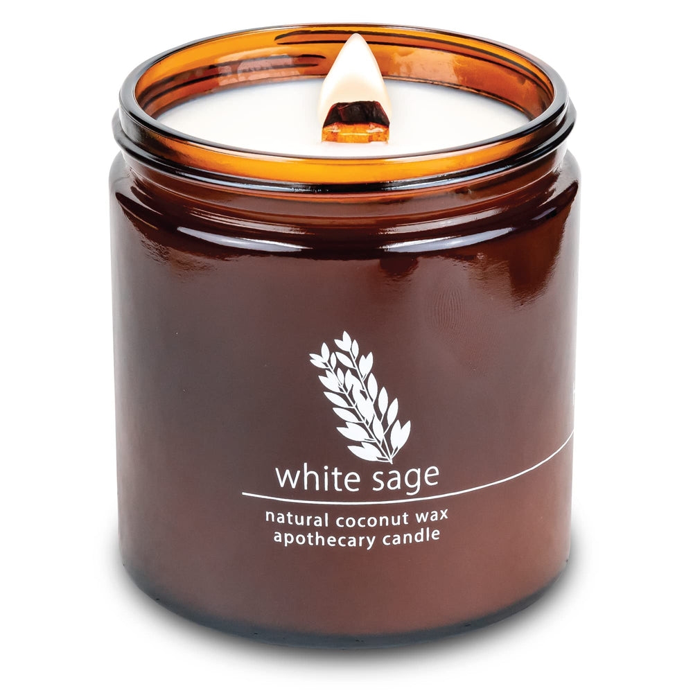 Hemlock Park crackling wood wick candle emitting a cozy glow