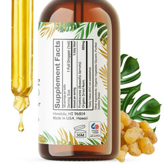 Herbal Wellness Hawaii frankincense liquid extract bottle on wood for daily routine