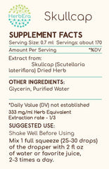 HerbEra Skullcap B120 dropper pouring for precise dosing.