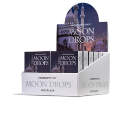 Historical Remedies Moon Drops bottle on a nightstand for easy bedtime use.