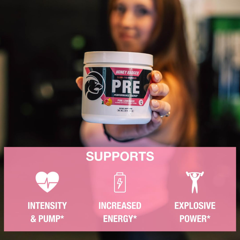 Mixing Honey Badger powder with water for refreshing workout drink.