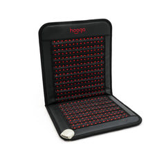 Hooga far infrared heat mat foldable for easy warmth beside a chair, ideal for quick sessions.