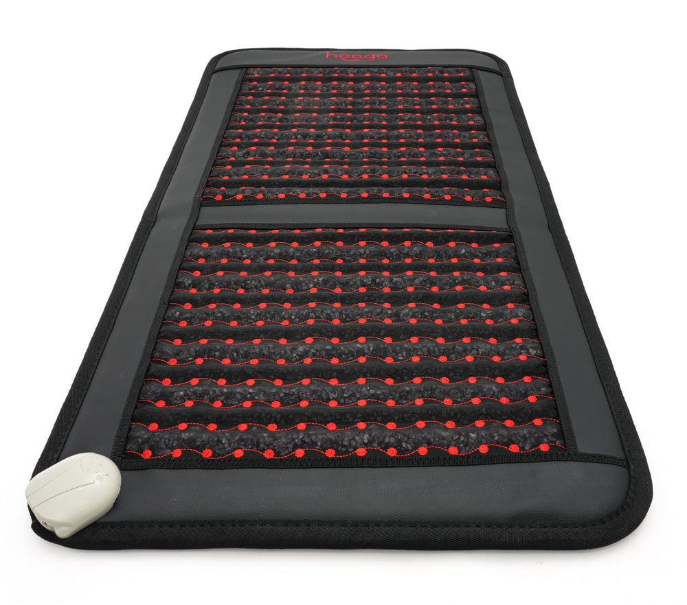 Hooga foldable mat placed on chair or bed, showing versatile at-home relaxation.