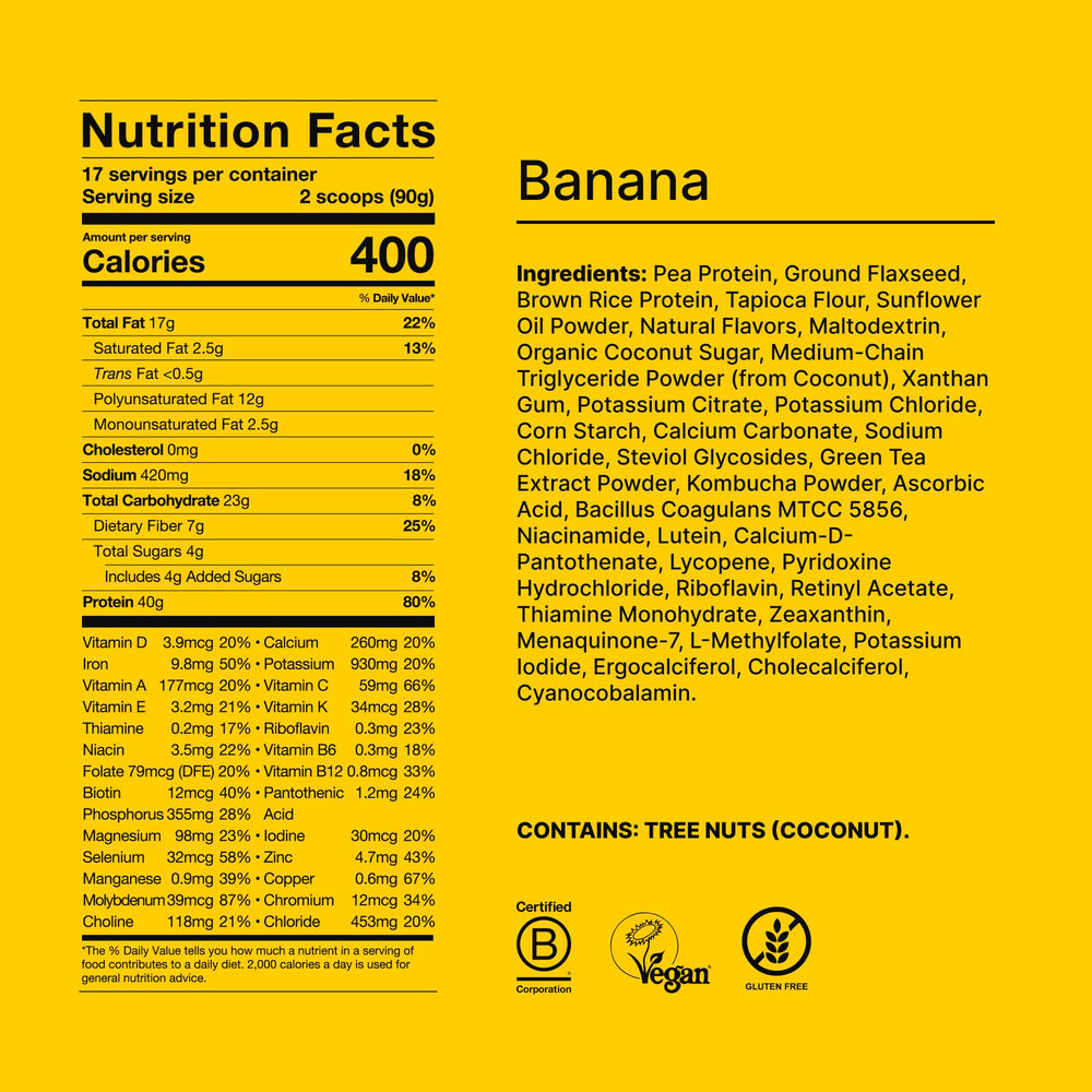 Huel Black Edition banana scoop positioned beside the tub for convenient servings