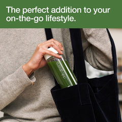 Huel Daily Greens shake glass with mint for a fresh routine