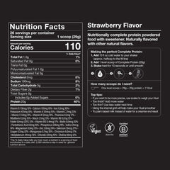Pouring Huel strawberry protein into a blender for smoothies.