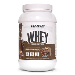 Huge Supplements Huge Whey bottle shows label highlighting 25g protein.