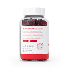 Humann Tart Cherry Gummies bottle dispensed, two gummies ready for daily routine.