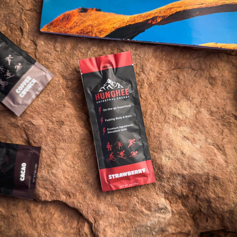 Hunghee athlete snacking scene shows versatile energy for runners cyclists hikers.