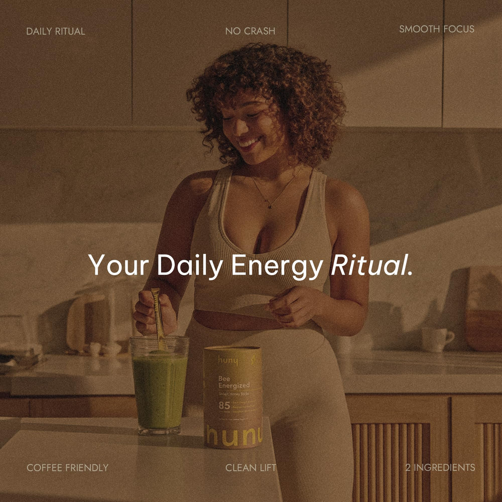 HUNY Bee Energized Shilajit Honey Stick mixed into a drink.