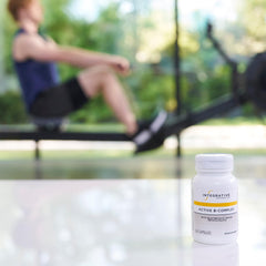 Active B-Complex capsules arranged for everyday wellness routine.