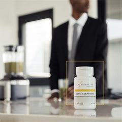 Integrative Therapeutics Zinc-Carnosine capsules on table for easy daily intake