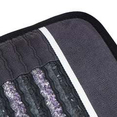 Close-up of amethyst-tourmaline chambers showing crystal energy and soothing heat.