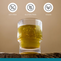 Isagenix Ionix Supreme being stirred into a glass for a warm wellness ritual