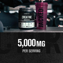 Jacked Factory Creatine Monohydrate powder mixing glass demonstrates fast solubility.