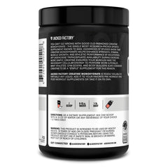 Jacked Factory Creatine Monohydrate being stirred into a drink.