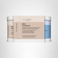 Jane Iredale Skin Complete box and bottle on shelf for daily skin wellness.