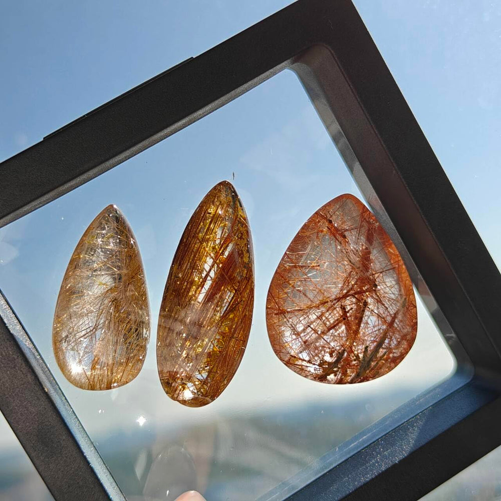 JDFlying rutilated quartz teardrop set with copper inclusions for unique accessory.