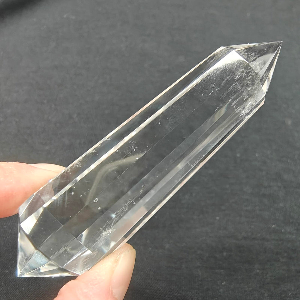 JDFlying Vogel crystal wand near workspace to support calm and clarity.