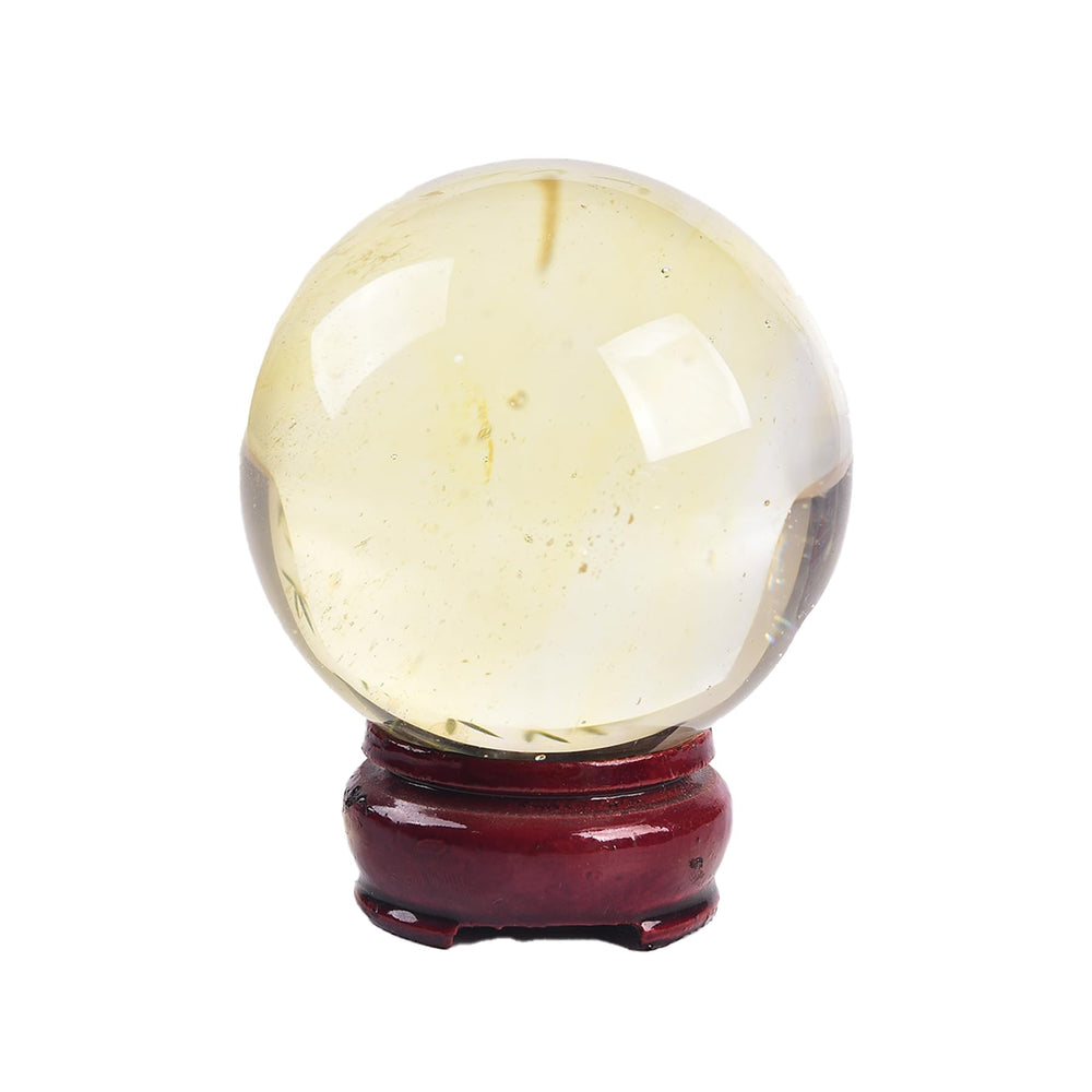 JIC Gem artificial smelted yellow quartz sphere with amber glow in sunlight