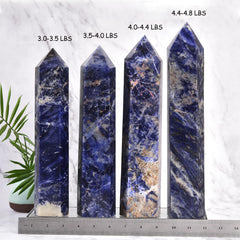 JIC Gem blue-veins sodalite crystal tower enhances ambiance and home decor.