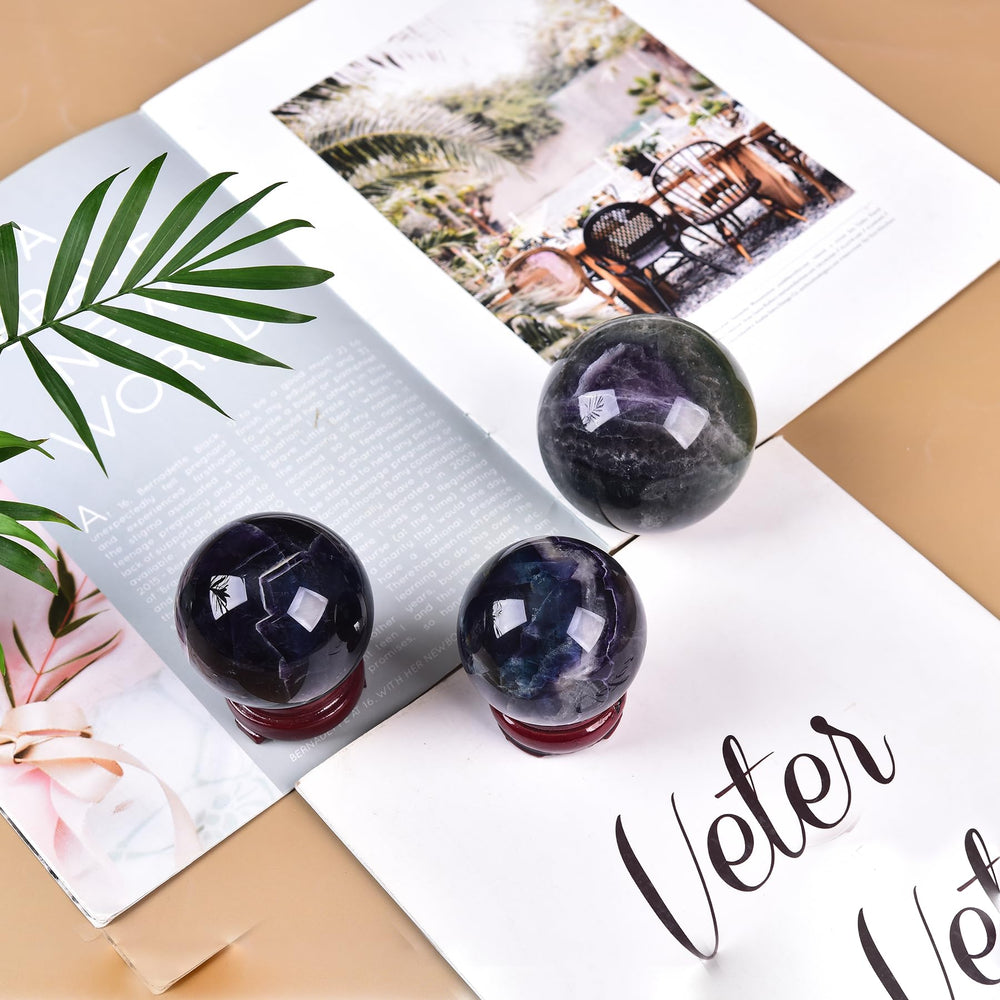 Vibrant fluorite sphere highlights unique patterns for a collector display.