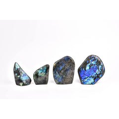 JIC Gem Labradorite palm stone in hand as a worry stone.