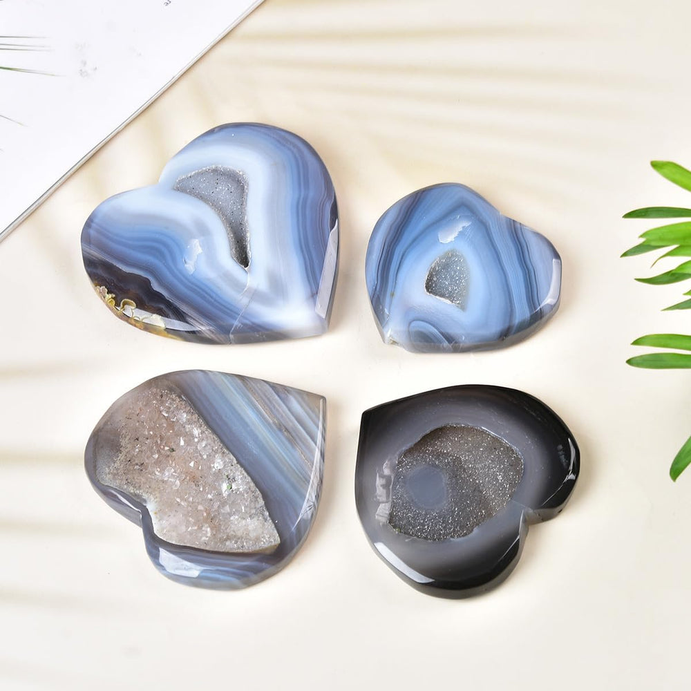 JIC Gem large agate heart palm stone held provides soothing tactile focus.