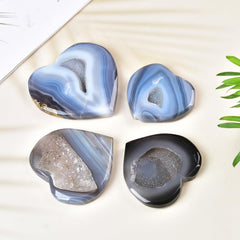JIC Gem large agate heart palm stone held provides soothing tactile focus.