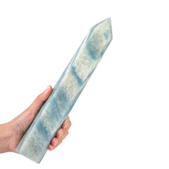 JIC Gem large trolleite obelisk tower in natural light for calming energy.