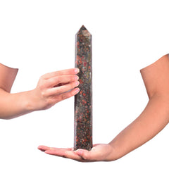 JIC Gem red agate crystal point emphasizes focus during Reiki and healing sessions.