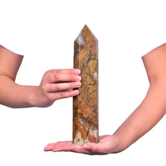 JIC Gem six-faceted yellow crystal wand for energy focus during sessions.