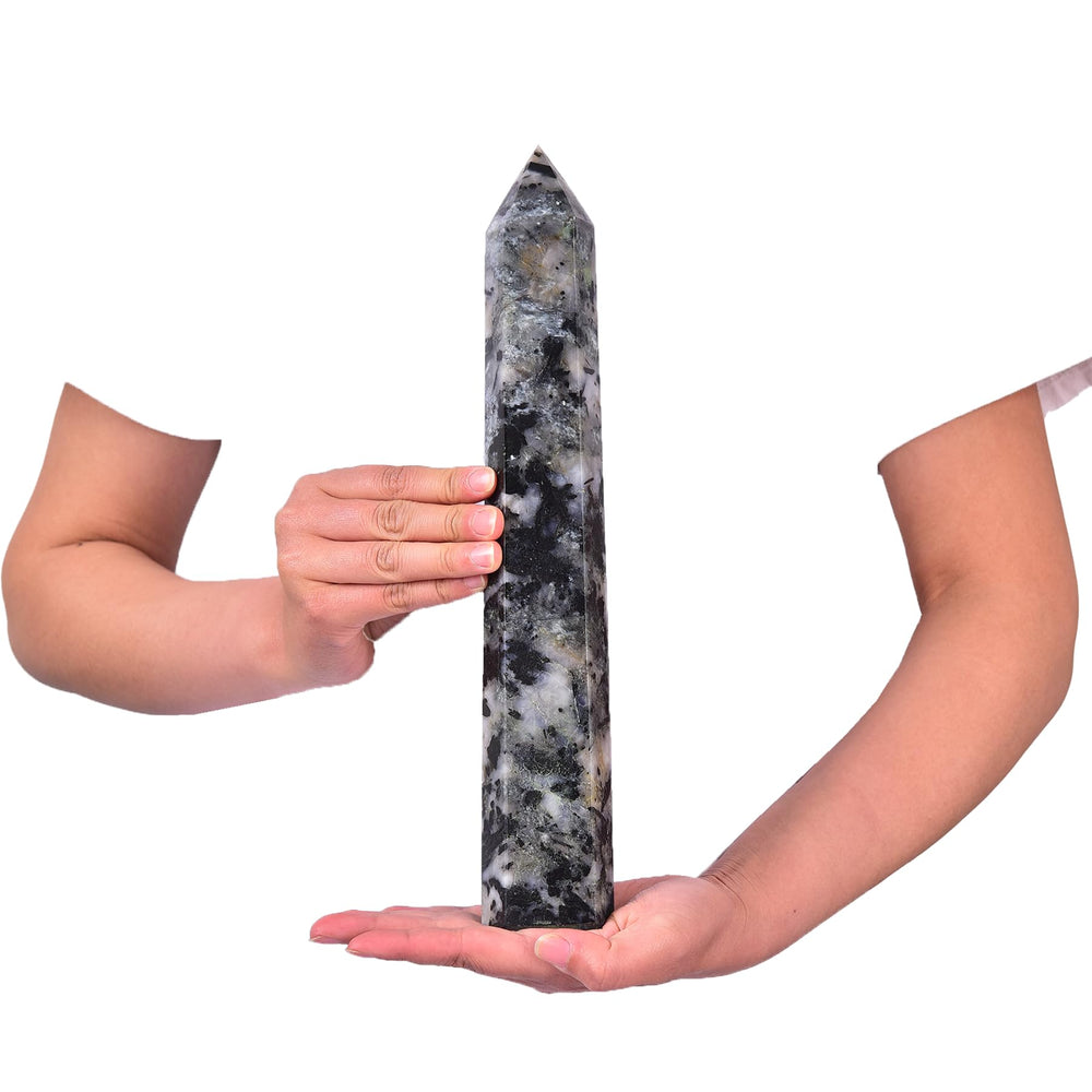 JIC Gem tourmaline quartz wand with six facets for focus during meditation and Reiki.