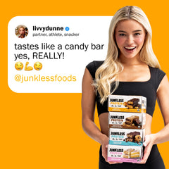 JUNKLESS bar being broken, showing chewy, fiber-rich interior.