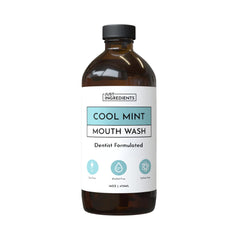 JUST INGREDIENTS Cool Mint mouthwash bottle highlights alcohol-free, enamel-friendly freshness for daily use.