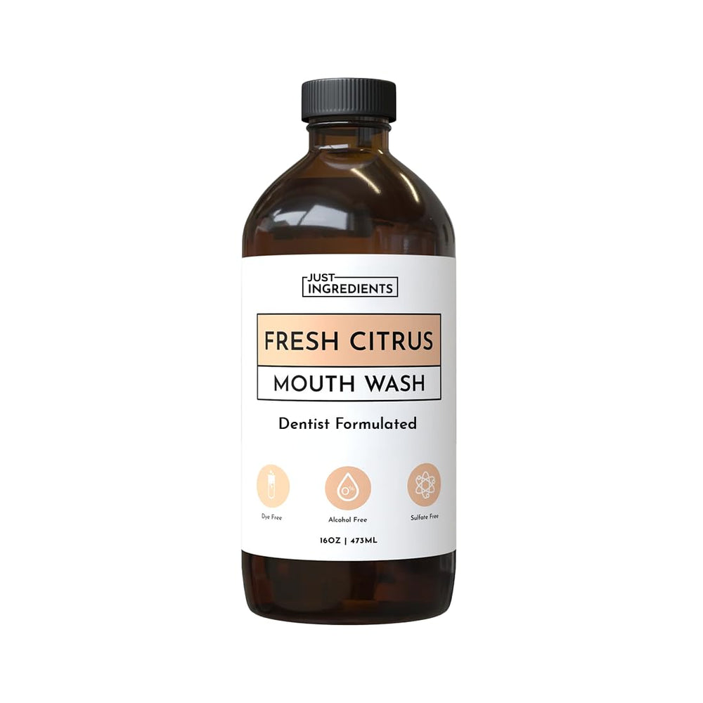 JUST INGREDIENTS Fresh Citrus Mouthwash bottle pour supports fresh breath and enamel care.