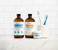 JUST INGREDIENTS Fresh Citrus Mouthwash label highlights enamel support with Hydroxyapatite and SilverSol technology.