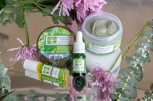 JustNeem Neem Cure Oil XL spray head close-up for targeted topical use.