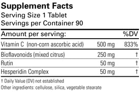 Karuna C-Plex bottle pouring capsules, illustrating daily vegetarian supplement routine