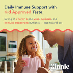 Child drinking Kinnie beverage from a cup, on-the-go wellness for school days