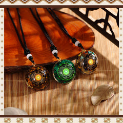 Konohan tiger eye pendant closeup highlighting natural texture.
